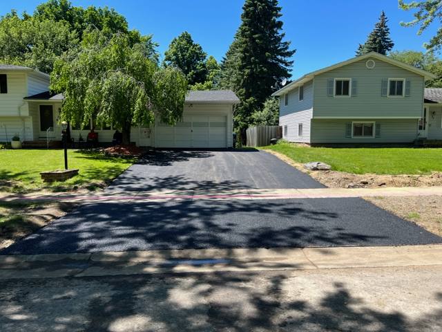 New driveway and apron under shade trees